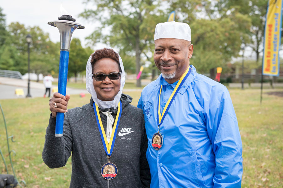 Nadirah and Askia Muhammad with Peace Torch